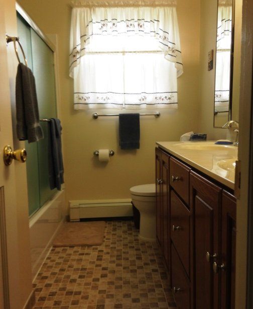 bathroom remodeling completed bathroom with pattern tile and frameless shower door